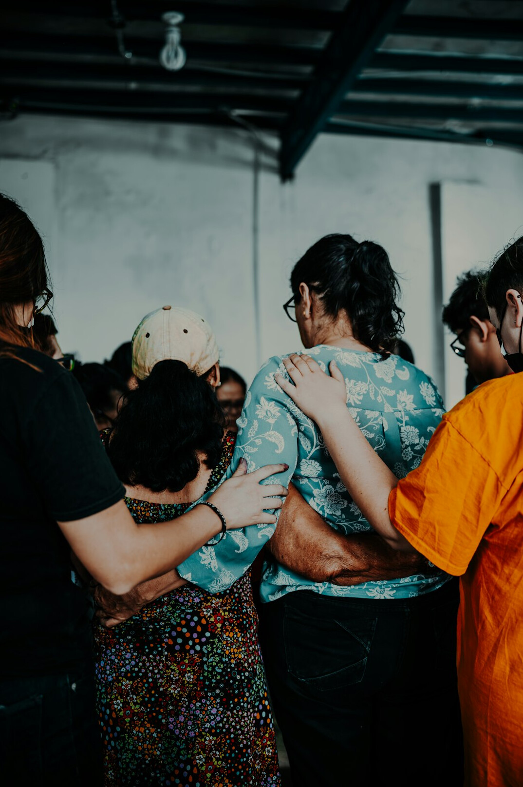 diverse group hugging