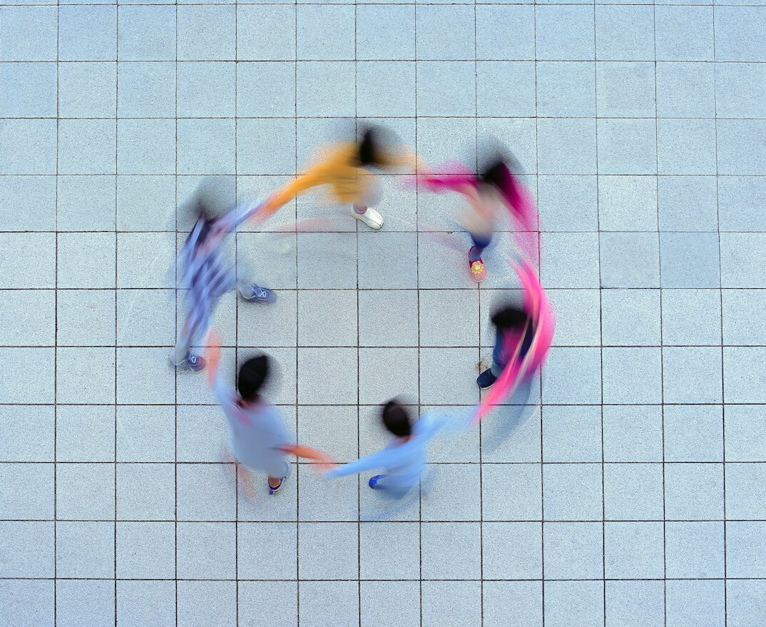 people discussing in circle