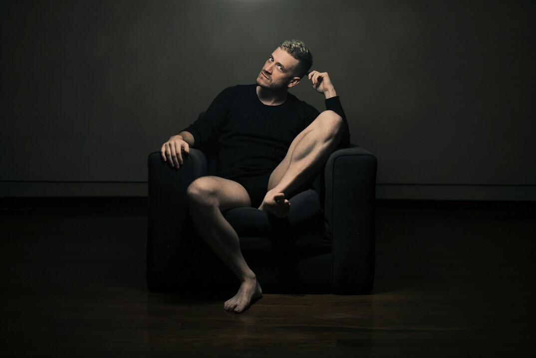 Studio portrait of a man psychologist in his thirties